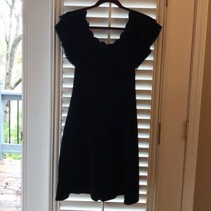 A black Eliza J on or off shoulder dress